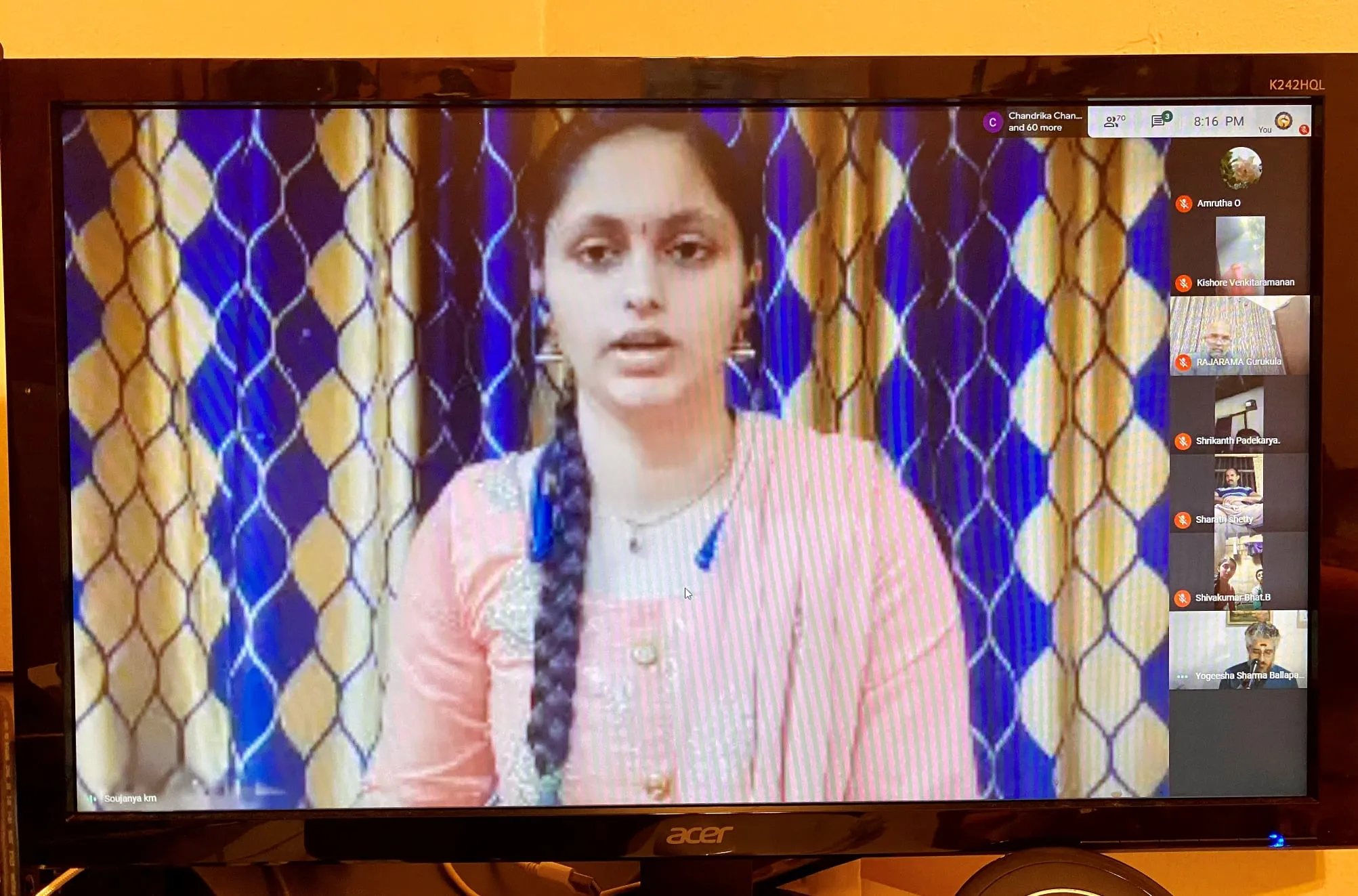 Screen capture from the third Samyoga online programme: the performer at his instrument fills the main window while the participants’ video tiles line the right-hand edge.